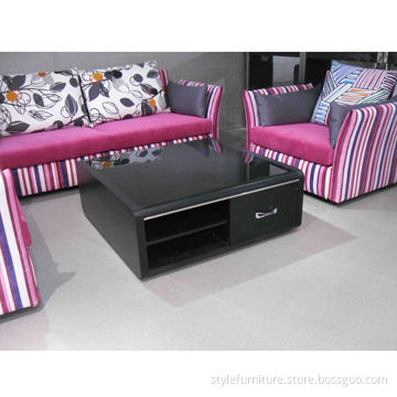 Glass top coffee table with square design